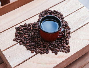 Heart-Shaped Coffee Beans with Cup in the Center  Love for Coffee Concept