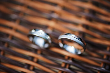 Elegant Closeup of Silver Wedding Rings on a Creative Background Setting