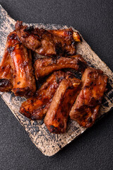 Meat, beef ribs in a marinade grilled with salt and spices. Grilled ribs