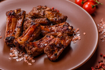 Meat, beef ribs in a marinade grilled with salt and spices. Grilled ribs