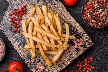 Food, French fries fried with salt and rosemary. Homemade crispy chips