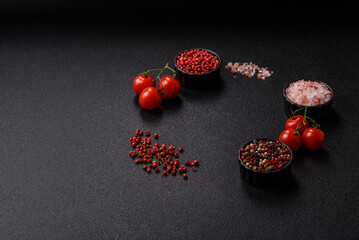 Ingredients for cooking cherry tomatoes, salt, spices and herbs