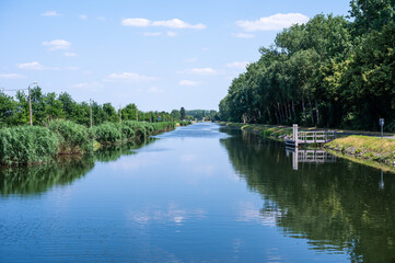 Natural green reflections at the banks of the canal in Tildonk, Haacht, Belgium