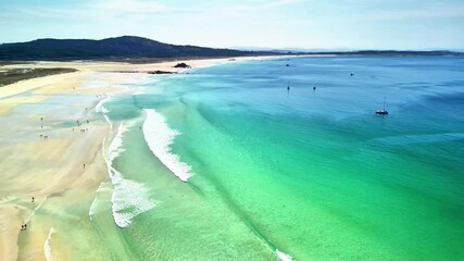 Explore this stunning beach with turquoise waters and soft sands, perfect for relaxation and adventure. - Powered by Adobe