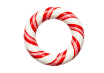 A festive candy cane ring with red and white stripes on a plain dark colored surface isolated on transparent background