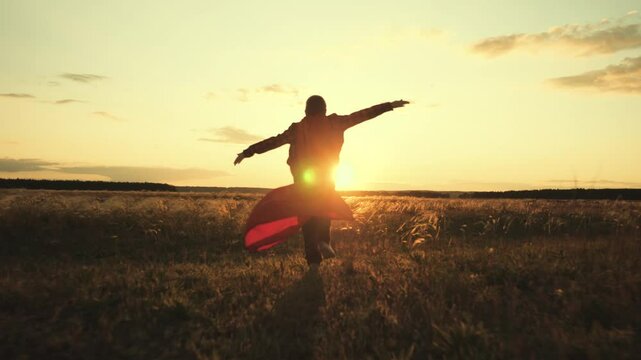Summer evening adventure awaits, Sunset flights of fancy for kids, Alone but never lonely in dreams, Child becomes legend at dusk, Silhouette races time in golden grass, Touched by the sun, guided by