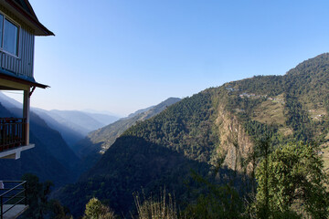 Vast green valleys and majestic mountains define the Annapurna trekking route in Nepal. A shelter...
