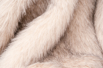 Texture of faux fur as a background, top view.