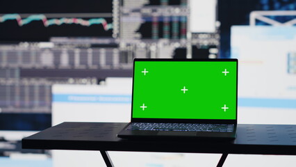 In a business finance space, pc screen showing isolated chroma key to help the strategy planning...