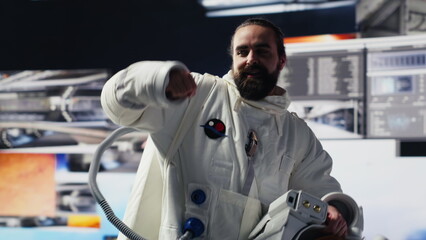 Cosmonaut in a space suit exploring the world above Earth, symbolizing the journey of humanity into...