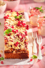 Hot red currant yeast cake made of berry fruits.