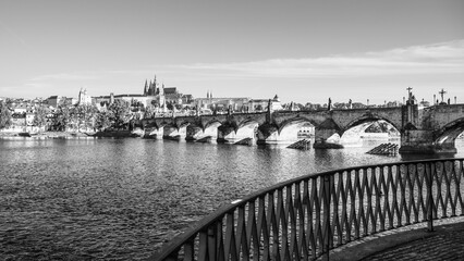 This captivating panorama showcases the majestic Prague Castle overlooking the Vltava River, with...