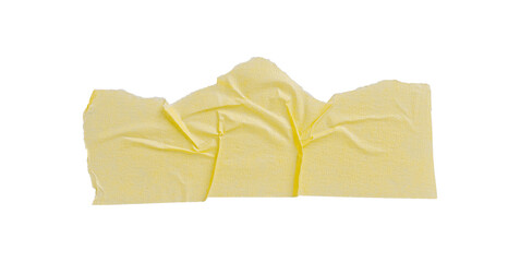 Yellow painter's tape isolated on white background, macro. Torn, crumpled, twisted strips of yellow...