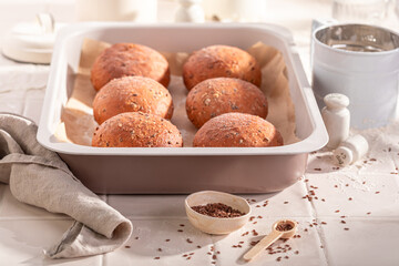 Hot and brown flax seed rolls for healthy breakfast.