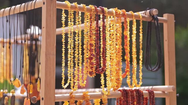 Valuable Jewellery Natural Amber Necklaces Sold on Outdoor Market Stand at Baltic Seaside Resort in Poland