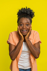 Oh my God, Wow. Excited amazed winner African American woman looking at camera with big eyes...