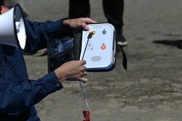 Lifesaving training using an AED. It is effective in helping the heart regain normal function by...