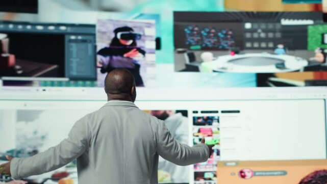User embraces abundance of video content displayed on digital wall dashboard, exploring entertainment channels. Concept of immersive streaming platform delivering nonstop videos, camera A