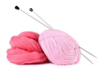 Felting wool and knitting yarn with needles isolated on white