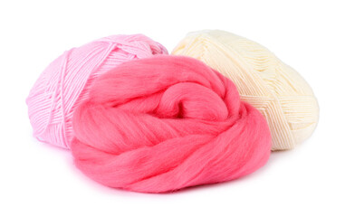 Felting wool and knitting yarn isolated on white