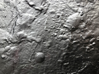 Rough textured shiny silver grunge graffiti background web wallpaper