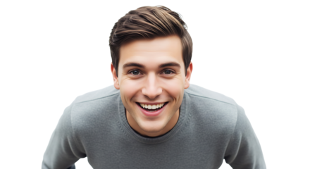 A young man with brown hair and a gray sweater smiling broadly against a black background looking up on transparent background