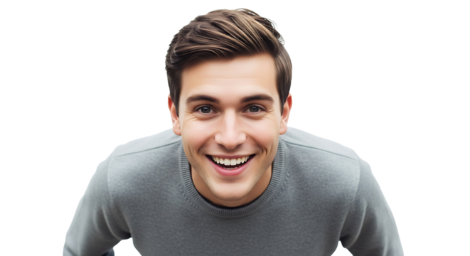 A young man with brown hair and a gray sweater smiling broadly against a black background looking up on transparent background