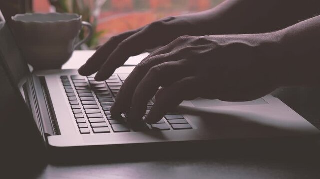 Typing on Keyboard in Office Environment &ndash; Close-up of Male Hands Writing on Computer