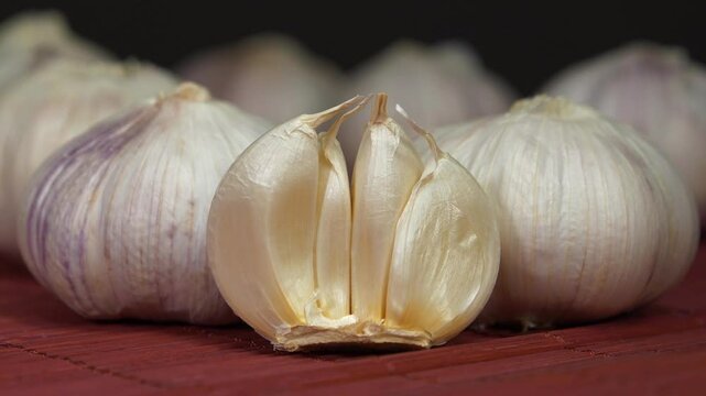Garlic - very healthy product with many beneficial properties for health. Garlic, Allium sativum, species of bulbous flowering plants in genus Allium