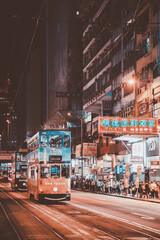 Tram and Bustling Night Scene in Hong Kong
