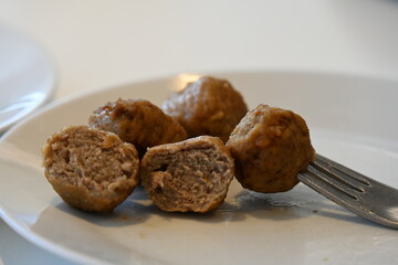 meatballs and mashed potatoes and food on a plate