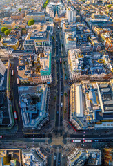 Aerial view of BBC Broadcasting House in London with the iconic All Souls Church and surrounding cityscape on a bright, clear day.