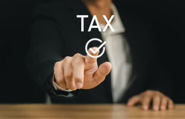 E-tax, Businessman show TAX for Individual income tax return form online for tax payment concept....