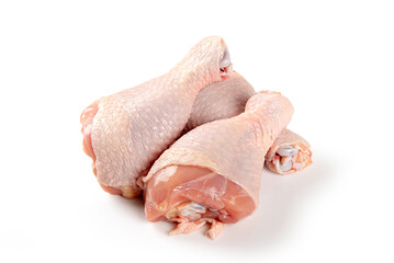 Raw chicken legs isolated on white background.