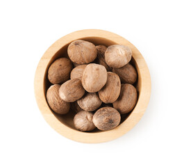 Nutmegs in bowl isolated on white, top view