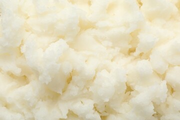 Texture of organic shea butter as background, top view