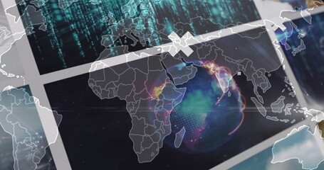 Displaying holographic globe and world map on flat screens at control desk, with code streams