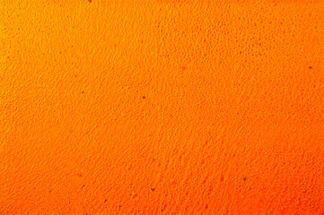 Naklejka premium Vibrant yellow paint strokes on canvas detail