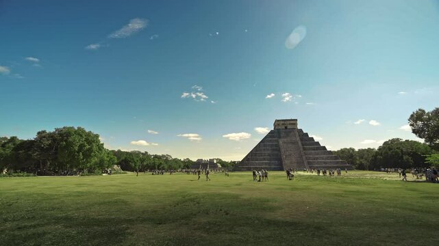 Chichen Itza Pyramid Kukulcan Distant View Across Plaza With Tourists