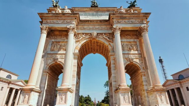 Arco della Pace crowned by a bronze quadriga presides over historic thoroughfare, Milan, Lombardy, Italy