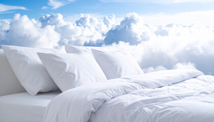 A comfortable white bedding is prepared against a background with a blue sky and white clouds.