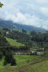 Image where you can see the peak of the mountain and some marvelous landscapes with clouds and...