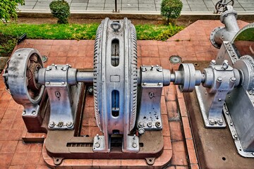 First hydroelectric generator installed in Ambato, Ecuador, operated from 1914 to 1993 showcasing intricate machinery and engineering marvel of renewable energy