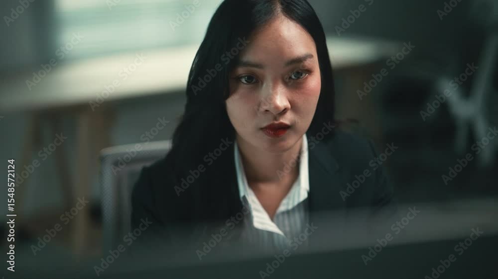 Poster professional asian businesswoman analyzing data on computer, working intently at desk with focused e