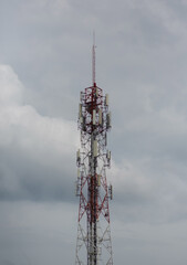 Cell phone signal tower on a cloudy day