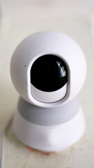 CCTV camera installed on the wall of the house.