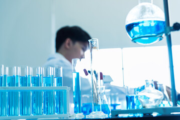 Science chemistry glass tubes objects on lab background. Liquid tube biology laboratory chemical fluid scientist object testing tubes medical glassware. Chemistry scientific pharmaceutical background