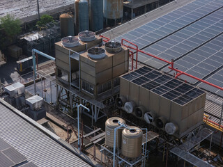Cooling towers in data center building. Air conditioning cooling towers in front of building with...