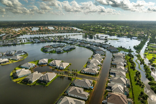 Hurricane Debby tropical rainstorm flooded residential homes in suburban community in Sarasota, Florida. Aftermath of natural disaster