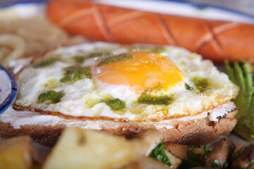 Delicious breakfast featuring fried egg and sausage